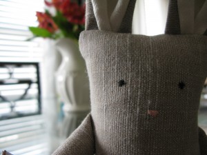 Close-up of hand-stitched eyes and nose :)