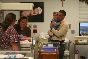 Nathan was a little unsure of his baby brother at first!